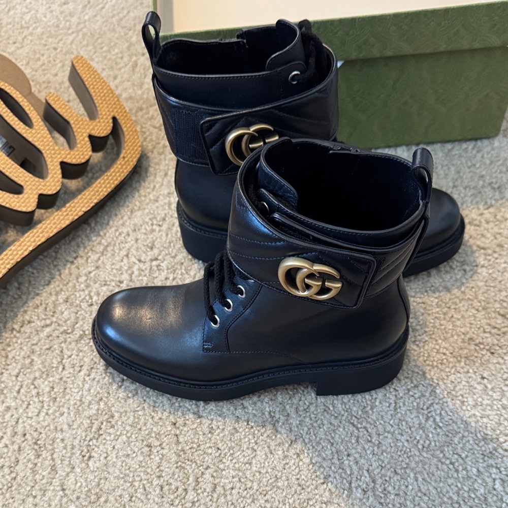 Gucci Black Ankle Boots with Gold Accents